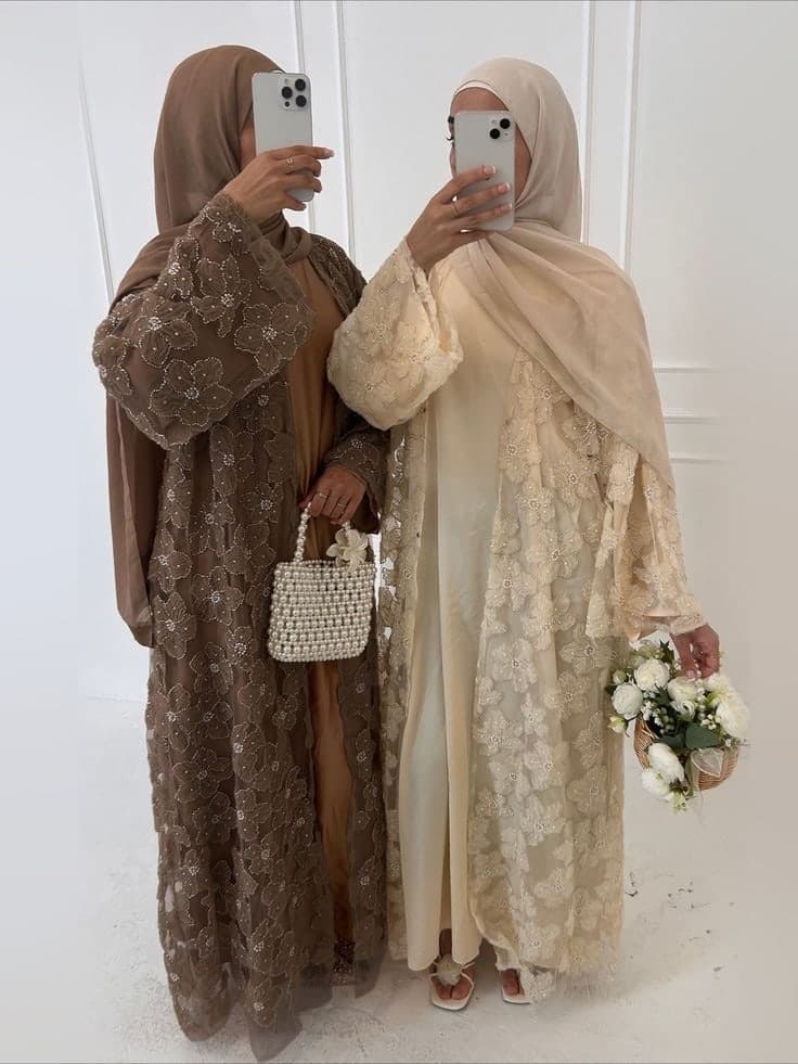 Nour embroidered abayas, styled together